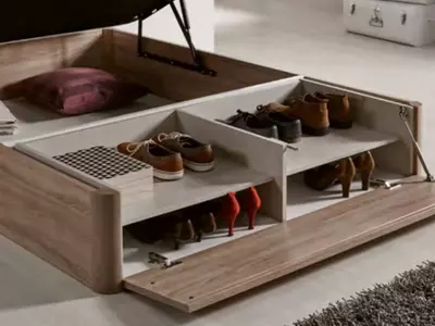 Canapé abatible con zapatero en madera. 